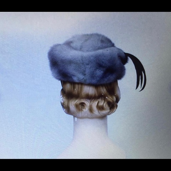 fur hat with feather